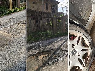 via-bessarione-e-via-fani-auto-danneggiate-dallasfalto-groviera